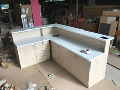 an office desk is being built in the middle of a room