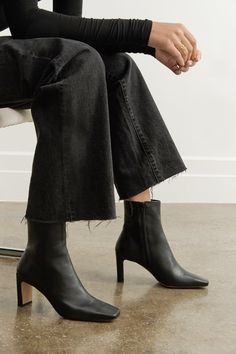 FINAL SALE - NO RETURNS, EXCHANGES, OR STORE CREDIT The sleek, modern look of our Dorset Narrow Heel Boots will set her apart from any other shoe in your collection. She's been handcrafted from smooth Italian leather with a chic square toe and monochrome zip. Set on a slim rectangular heel, she looks just as good paired with jeans as she does with dresses. [SPLIT] Astrid is shown wearing the Dorset Narrow Heel Boots in black, in lavender, and in sand. The heel is approximately 3" (7.7 cm) in hei Heels Boots Outfit, Black Sock Boots, Minimalist Closet, Timeless Outfits, Fashion Inspiration Board, Black Heel Boots, Grey Boots, Womens Fashion Inspiration, Simple Chic