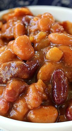 a close up view of some kind of stew with carrots and raisins