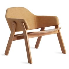 the chair is made from wood and has a leather upholstered seat, with a wooden