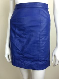 vintage electric blue high waisted leather miniskirt 'Berman's' tag size 6, fits modern x-small - small 25 inch waist, 34 inch hip measurement 18 inch length 6 1/2 inch covered back zipper w/ snap at waistband lined in blue nylon great condition, no marks or flaws visible Fitted Blue Leather Bottoms, Blue High Waist Fitted Mini Skirt, Blue Fitted Mini Pencil Skirt, Fitted Blue Mini Pencil Skirt, Fitted Leather Skirt For Summer, Blue Leather Skirt, Vintage High Heels, Leather Miniskirt, Avon Fashion