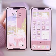 two pink iphones sitting next to each other