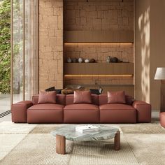 a living room filled with furniture and a brick wall