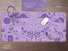 a purple mouse pad sitting on top of a wooden desk next to a computer keyboard