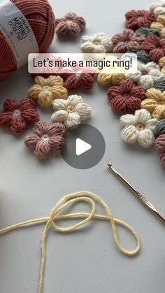 crochet yarn and knitting needles on a table with the words let's make a magic ring