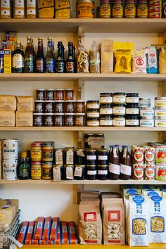 shelves filled with lots of different types of food