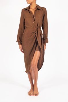 DESCRIPTION The pulled together look of a button-down with the elan of a wrap style, our L.A. Button Down Asymmetric Wrap Midi Dress is the best of both worlds. Now in a longer length for more versatility in the evening, it proves carefree can also be chic: just button up and go. PRODUCT DETAILS Fits true to size Linen cupro blend Opaque Recycled resin tortoise buttons Button up Self-tie wrap skirt Darted back details Collar detail Unlined Composition: 58% linen, 42% cupro Machine washable or ec Button Down Midi Dress, Cupro Fabric, Sustainable Manufacturing, Tie Wrap, Wrap Midi Dress, Out Of Shape, Bodycon Fashion, A Button, Black Friday Sale