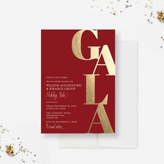 an elegant red and gold wedding card with the word gaia on it, surrounded by confetti