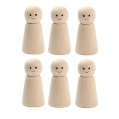 six wooden pegs with faces and eyes are shown in the shape of small people