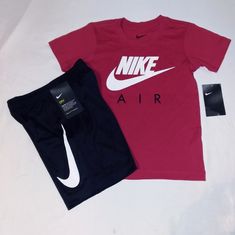 New With Tags, Nike Set Includes A Soft Lightweight Cotton Blend Red With Black And White Trim Short Sleeve Tee Top With Classic Nike Swoosh Check Logo And "Nike Air" Inscription On Front. Bottoms Are Black Polyester Blend With Elastic Waistline With Nike Swoosh Check Logo On Left Leg. Set Fits 6 Youth Boys. Great Set For Any Occasion And Every Season. Thanks And Have A Great Day! Nike Casual Cotton Sets, Casual Nike Cotton Sets, Casual Cotton Nike Sets, Casual Nike Sports Sets, Sporty Red Sets For Spring, Red Sports Sets For Spring, Summer Red Set With Graphic Print, Nike Sports Sets For Summer, Red Graphic Print Sets For Spring