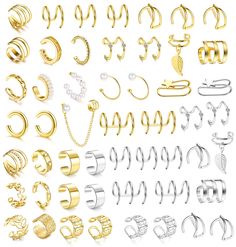 many different types of earrings and rings on a white background with clippings for text