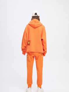 Details: Slim fit cotton sweatpants in clementine orange Flat front zip pockets Tapered fit Pair with Clementine Smiley Hoodie Materials & Care: 100% Cotton Hand wash | Dry clean Do not bleach Size & Fit: Model is 5'7", Bust 32, Waist 24, Hips 35, wearing a size S *This item is final sale* Item #: HK4PA09 Smiley Hoodie, Cloud Sweatshirt, Clementine Orange, Orange Flats, Hooded Wool Coat, Quilted Sleeves, Slim Sweatpants, Cotton Sweatpants, Quilted Puffer Jacket