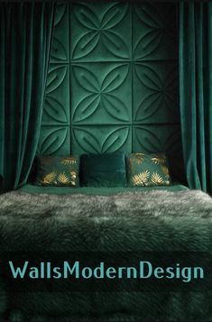 a bedroom with green walls and pillows on the bed