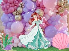 the little mermaid is standing in front of balloons