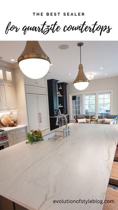 the best sealer for granite countertops is in this kitchen with white cabinets and an island