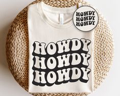 a white t - shirt with the words hordy howdy printed on it