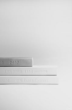 three different types of business cards are stacked on top of each other in black and white