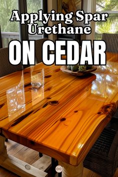 a wooden table with the words applying spar urethane on cedar in front of it