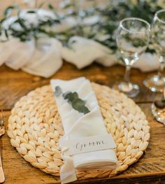 a place setting with napkins and silverware