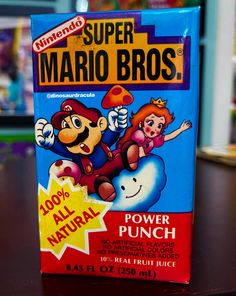 an unopened box of mario bros power punch on a table in a store