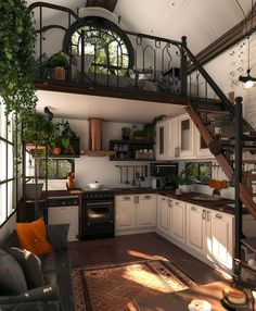 a living room and kitchen area with stairs to the second floor, potted plants in pots on the wall