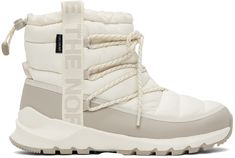 Ankle-high quilted ThermoBall™ Eco-insulated recycled PET ripstop boots in white. Water-repellent non-PFC DWR coating. · Waterproof DryVent™ membrane · Lace-up closure · Logo-woven webbing trim at sides · Bungee-style drawstring at collar · Pull-loop at heel counter · Cushioned OrthoLite® Eco LT™ footbed · Faux-fur lining · EVA foam rubber midsole · Treaded rubber outsole Supplier color: Gardenia white/Silver grey North Face Boots, North Face Outfits, Eva Foam, Wedge Sneaker, Lace Up Boots, Luxury Streetwear, White Silver, Cute Shoes, North Face