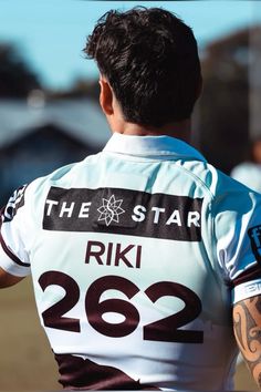 the back of a man's shirt that reads the star riki 2082