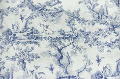 a blue and white toiler print fabric with animals in the woods on it