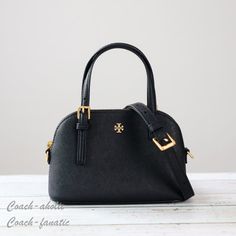 Nwt Tory Burch 149694 Emerson Dome Satchel Saffiano Leather Crossbody In Black Details: Saffiano Leather Gold Tone Hardware Zip Closure 1 Interior Slip Pocket Removable And Adjustable Crossbody Strap Adjustable Top Handle Straps Approx. Measurement: 8" X 5.5" X 3" In Smoke Free Home!! All Items Are Guaranteed 100% Authentic And Brand New ! Black Top Handle Satchel For Errands, Everyday Black Top Handle Satchel, Tori Burch Handbags Black, Black Crossbody Bag Tory Burch, Black Satchel With Gold-tone Hardware Shoulder Bag, Tory Burch Bags, Tory Burch Bag, Crossbody Strap, Leather Crossbody