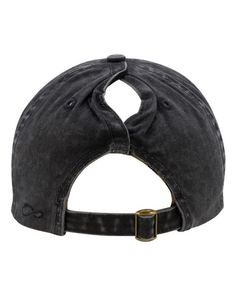 a black hat with a metal buckle on the front and side, it is worn by someone