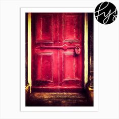 an old red door with a black and white monogrammed logo above it that says,