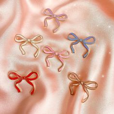 Our coquette aesthetic enamel bow pin adds a touch of charm & whimsy to just about anything!  Available in ballet pink, bright pink, tomato red, sky blue, lilac & white - there's the perfect color for every vibe!  Hard enamel & polished gold pin.   Colors: ♥ Bright Pink ♥ Pearlized Ballet Pink ♥ Pearlized White ♥ Sky Blue ♥ Lilac ♥ Tomato Red ♥ Measurements: approx. TBD ♥ Materials: hard enamel & polished gold plating ♥ Designed by & exclusive to Wildflower + Co.; logo on backside ♥ Imported ♥ Product safety - intended for use by adults only; CA residents - see shop policies for Prop 65 warning ♥ Includes 1 pin" Aesthetic Ribbon, Pink Coquette Aesthetic, Cute Enamel Pins, Lilac White, Blue Lilac, White Sky, Gold Pin, Pink Coquette, Ballet Pink