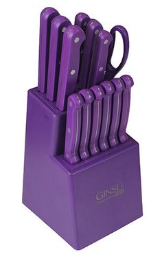 a purple knife holder with six knives in it