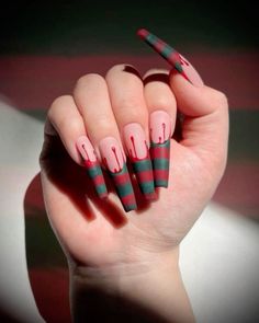 Stiletto nails Quirky Nails Acrylic, Coffin October Nails, Fredy Krueger Nails Art, Simple Halloween Manicure, Square Spooky Nails, Plum Halloween Nails, Pinstripe Nail Designs, Freddy Kruger Nails Acrylic, Scary Acrylic Nails