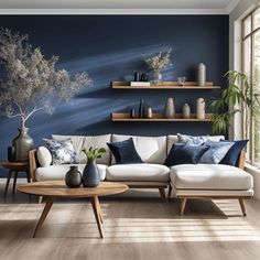 a living room with blue walls and white furniture in the center, along with potted plants