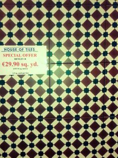 a tile wall with a price label for the house of tiles special offer $ 20 00 per square