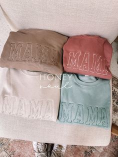 "Neutral Embroidered MAMA Lightweight Sweatshirt This cozy fleece lined sweatshirt makes a great gift for any mama or mama to be! Color: Tan, Dust, Mauve, Dusty Blue (see photos for colors shown) Fit: Unisex, Fits loose/relaxed (SEE SIZE GUIDE IN PHOTOS) Sizing: S,M,L,XL Material: ringspun 50% Cotton, 50% Polyester *this is a LIGHTWEIGHT sweatshirt; it is not thick* Font of the embroidery will be as pictured & all letters will be automatically capitalized (this cannot be changed).  Thread color for embroidery will have more of a monochromatic look to match the color sweatshirt. *Thread color CANNOT be changed* This item has LIMITED customization requests You may request customization within these limits: -ONLY ONE WORD -Must be a short word like (MAMA, DADA, AUNTIE, WIFE, WIFEY, BRIDE, BAB Mama Embroidery, Unique Sweatshirt, Color Dust, Womens Sweatshirts, Cozy Lounge, Mama Sweatshirt, Causual Outfits, Embroidered Sweatshirt, Embroidered Sweatshirts