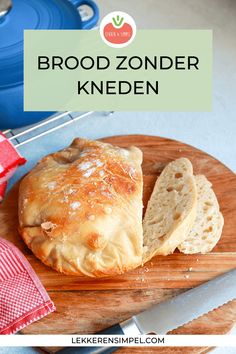 a wooden cutting board topped with bread