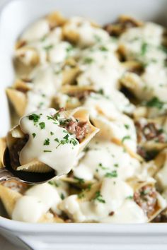 a close up of a spoon with some food on it