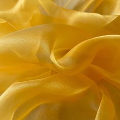 "Yellow Crystal Sheer Organza Fabric by the Yard is a luxurious lightweight & soft fabric with an extremely beautiful shine to it. Organza fabric has a stiffness to it so can hold in place. Create volume apparel, tutu dresses, voluminous gowns, puffy dresses, fluffy skirts, ballet costumes and so much more. Works wonderfully for clothing and seating decor, aisle runners, table clothes, and wedding arches and chair sashes. Due to its stiffness can help to lend volume when sewing gowns, dresses, b Dresses Fluffy, Sewing Gowns, Golden Yellow Dress, Sewing Desk, Runners Table, Deck Pictures, Aisle Runners, Table Clothes, Collection Ideas