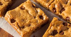 chocolate chip cookie bars cut into squares on a cutting board