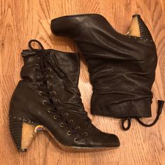 These Edgy Leather Booties, With Diagonal Lacing And Stud Trimmed Cone Heels Definitely Command Attention. Excellent Condition. Slight Mars In Heels (Pictured). 4” Heel Cone Heels, Irregular Choice Shoes, Irregular Choice, Western Booties, Leather Booties, Lace Up Boots, Mars, Shoe Laces, Wicked