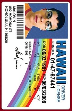 a close up of a person's identification card with a rainbow in the background