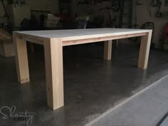 a table made out of wood in a garage