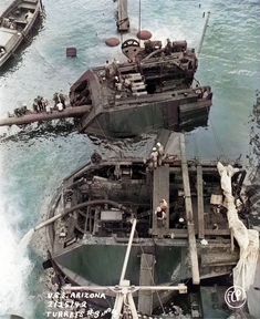 an old photo of two ships in the water with people on them and one is sinking