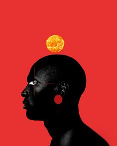 the silhouette of a man's head with an orange ball on top of his head