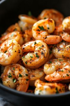 Grilled shrimp seasoned with herbs in a black bowl. Frozen Shrimp In Air Fryer, Healthy Air Fryer Shrimp, Shrimp From Frozen, Linguine Recipes Easy, Air Fryer Frozen Shrimp, Shrimp In Air Fryer, Shrimp And Veggies, Broiled Shrimp, Air Fryer Shrimp