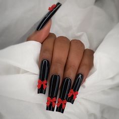 A noir black set with a red bow on all fingers and a glossy finish.  Nails with large charms can snag on items and may be difficult to wear for beginners or people that use their hands for work or aren't able to prioritize delicate hand movements and nail protection!*  Available in: Shape: Mini Square, Short Square, Medium Square, Medium Coffin, Medium Stiletto, L Square, L Coffin, L Stiletto, XL Square, XL Coffin, XL Stiletto, 2XL Square, 2XL Coffin, 2XL Stiletto, 3XL Square, 3XL Coffin, and 3X Black Nails Long Square, Black Square Acrylic Nails, Nail Protection, Nails Goth, Medium Stiletto, Black Stiletto Nails, Nails Fall Nails, Hand Movements, Color For Nails