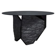 a black table with an unusual design on it's top and bottom, in front of a white background