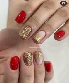 red and gold manies with glitter on the tips are perfect for any woman's nails